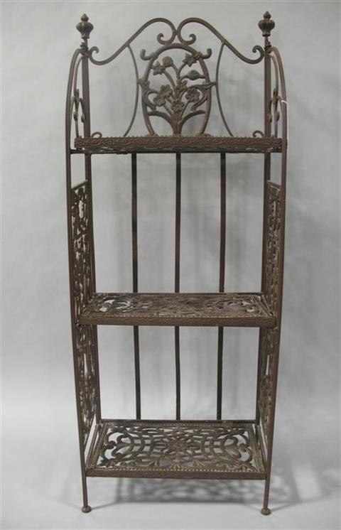 Appraisal: WROUGHT IRON PLANT STAND Collapsible with scrolling crest over central