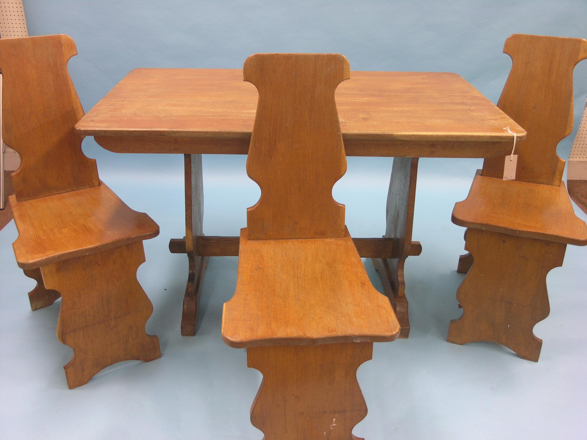 Appraisal: A light oak dining room set four-seater table on shaped