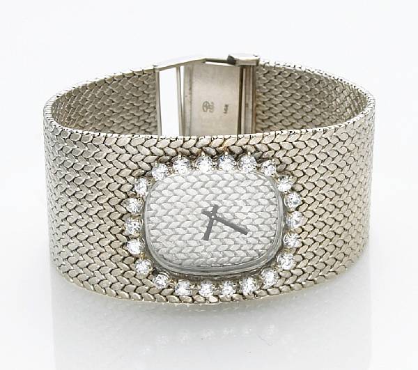 Appraisal: A lady's k white gold cubic zirconia integral bracelet wristwatch