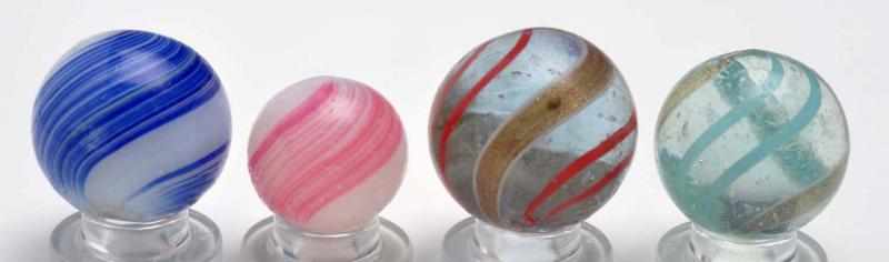 Appraisal: Lot of Handmade Marbles Description Includes two transparent lutz marbles