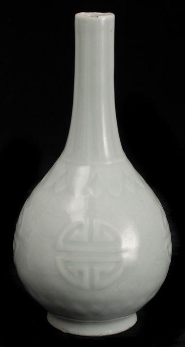 Appraisal: CHINESE CELADON-GLAZED PORCELAIN BOTTLE VASE With overlapping petal tip band