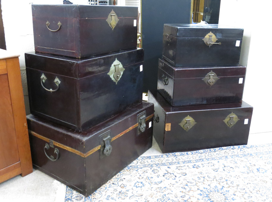 Appraisal: SIX CHINESE LIFT-TOP TRAVEL TRUNKS all wood construction wrapped in