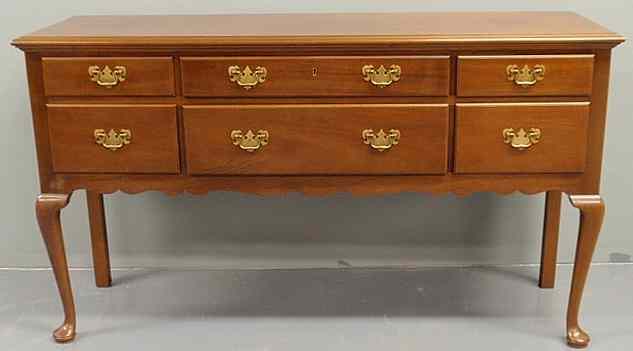 Appraisal: Kittinger Queen Anne style mahogany huntboard with a scalloped apron