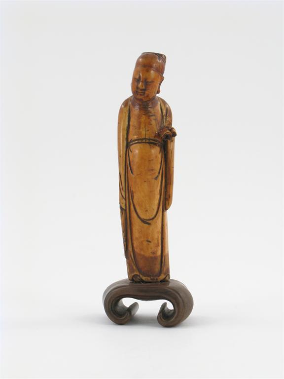 Appraisal: A Chinese ivory carving of a figure