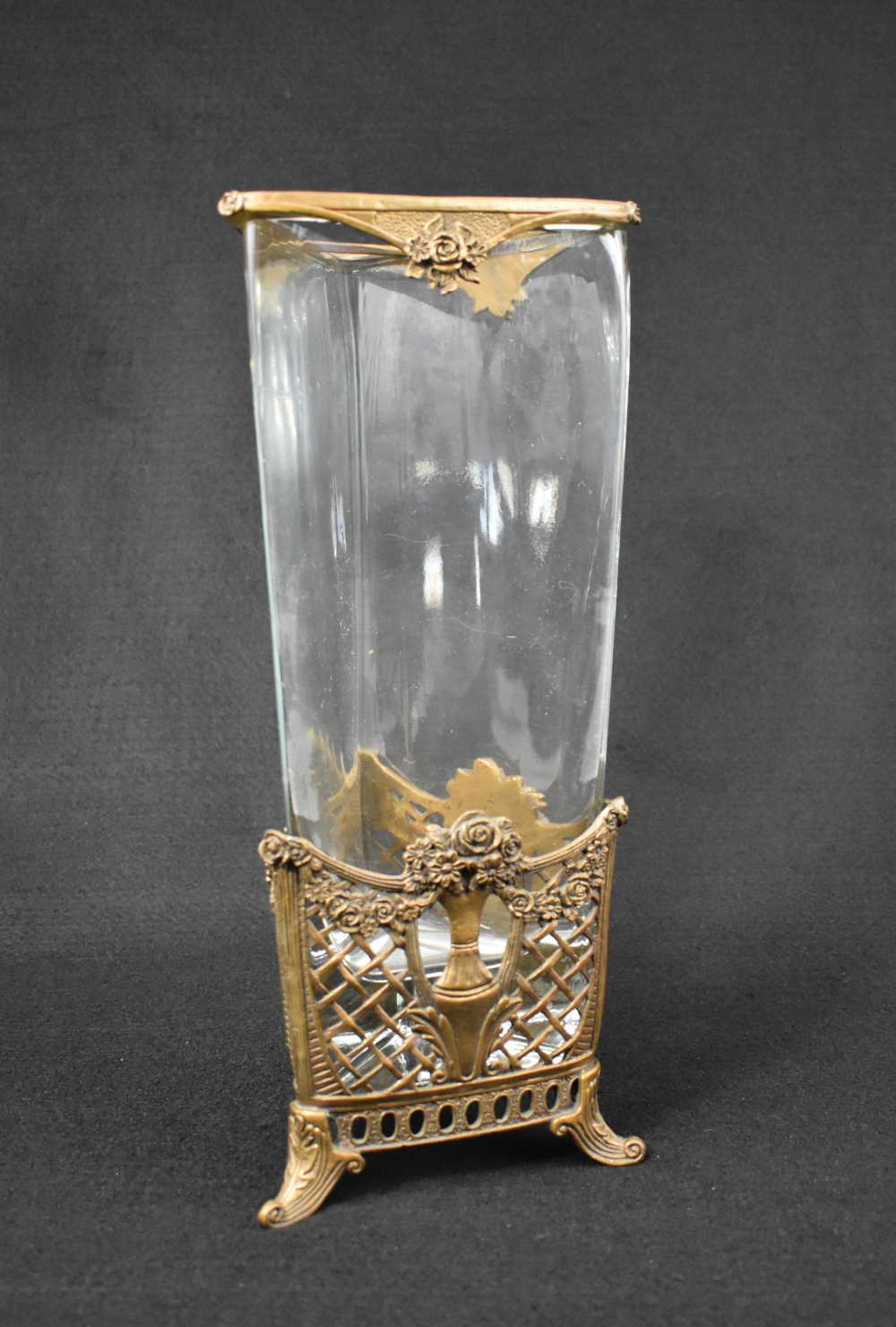 Appraisal: METAL MOUNTED COLORLESS GLASS VASEProbably French First Half of the