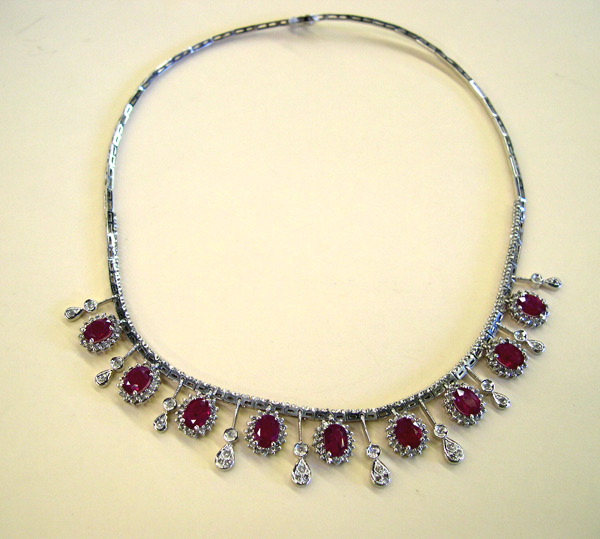 Appraisal: Fourteen-Karat White Gold Ruby and Diamond Pendant Necklace composed of