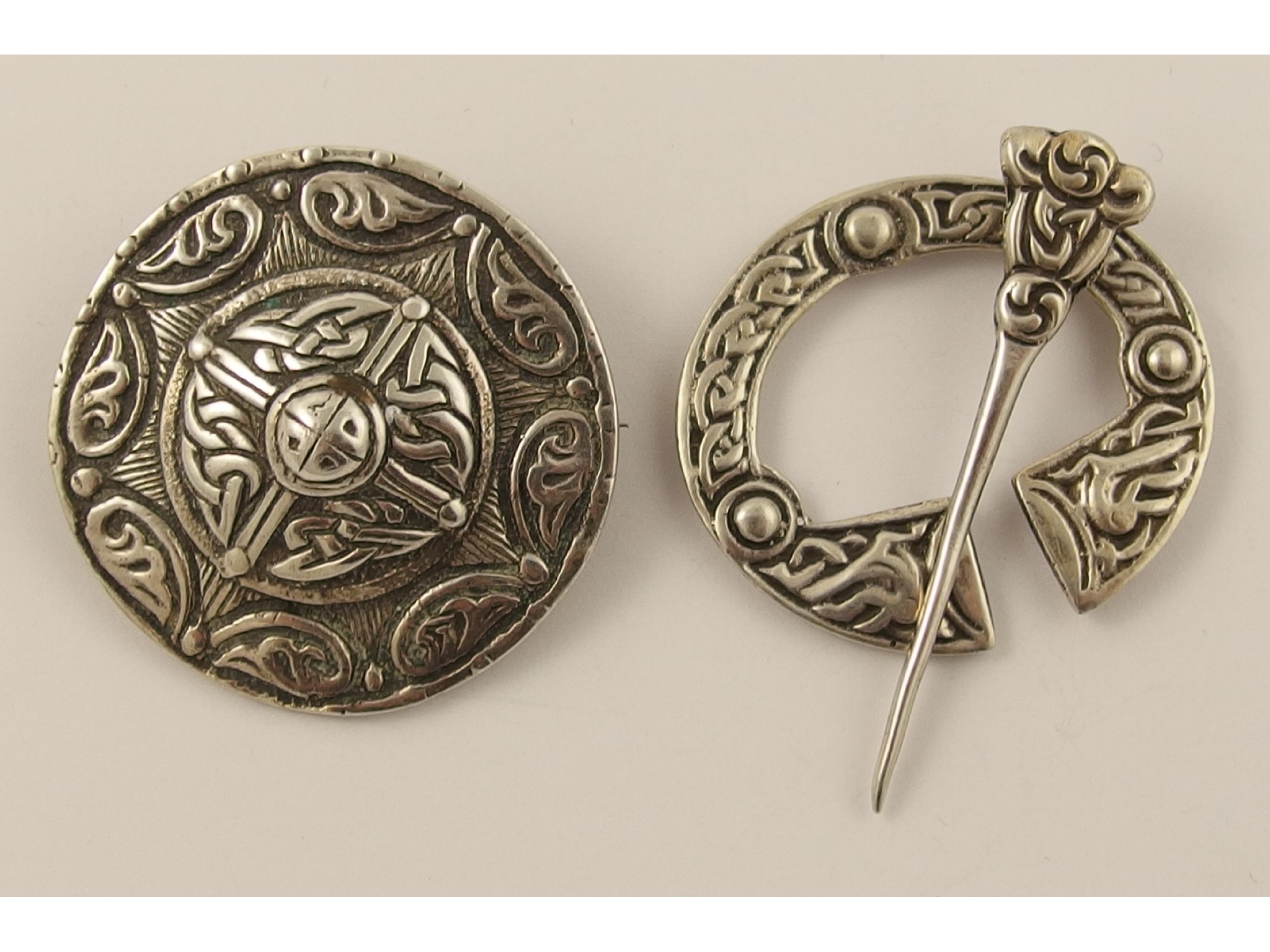 Appraisal: A silver brooch by Iain MacCormick Iona with further example