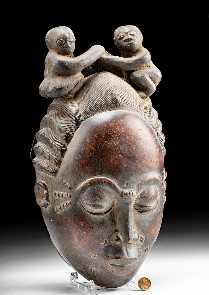 Appraisal: Early th C African Baule Wood Mask w Figures Western