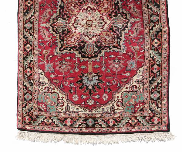 Appraisal: A group of three Indian rugs size approximately ft x