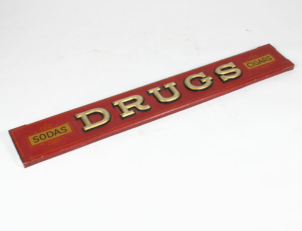 Appraisal: A painted wood drugstore sign with gilt applied letters W