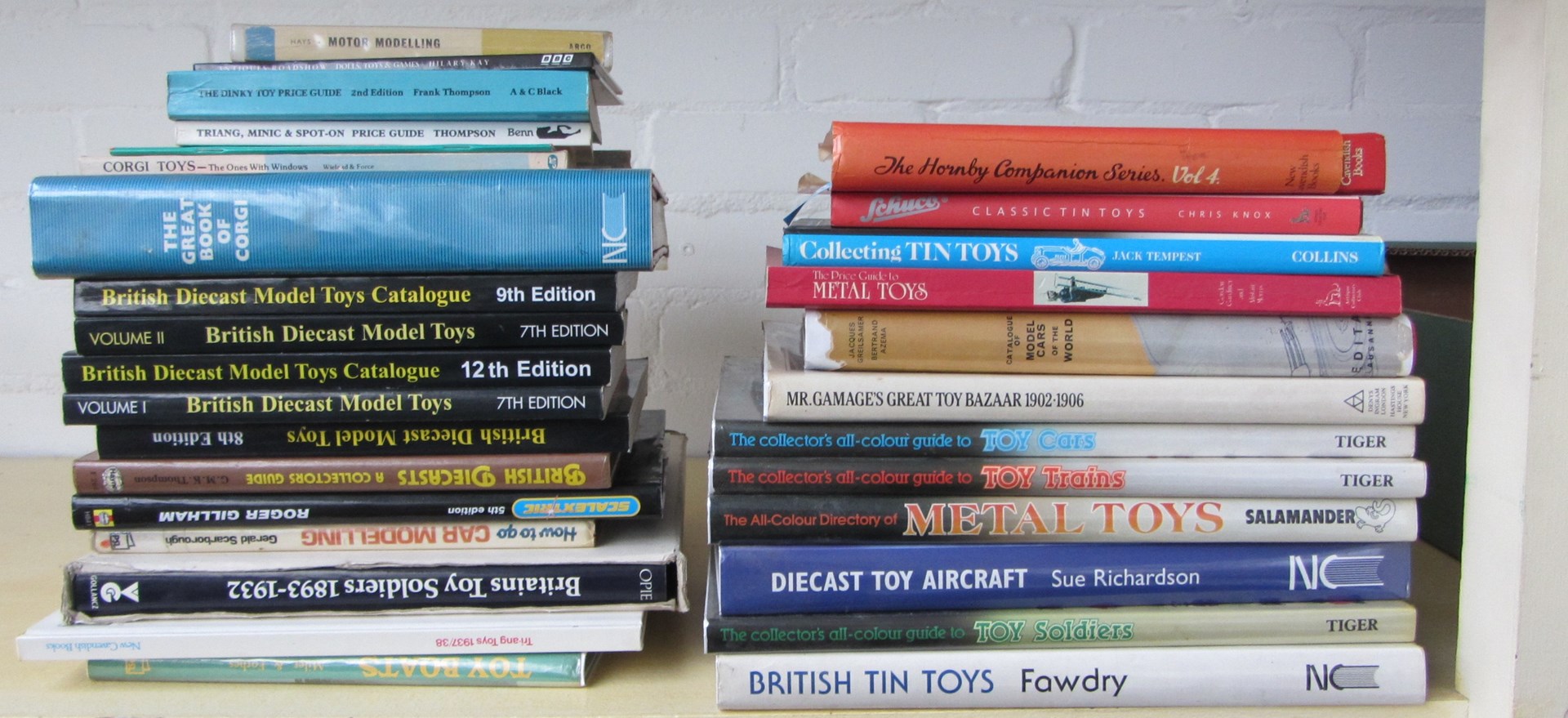 Appraisal: A quantity of toy reference books including tinplate die-cast Britains