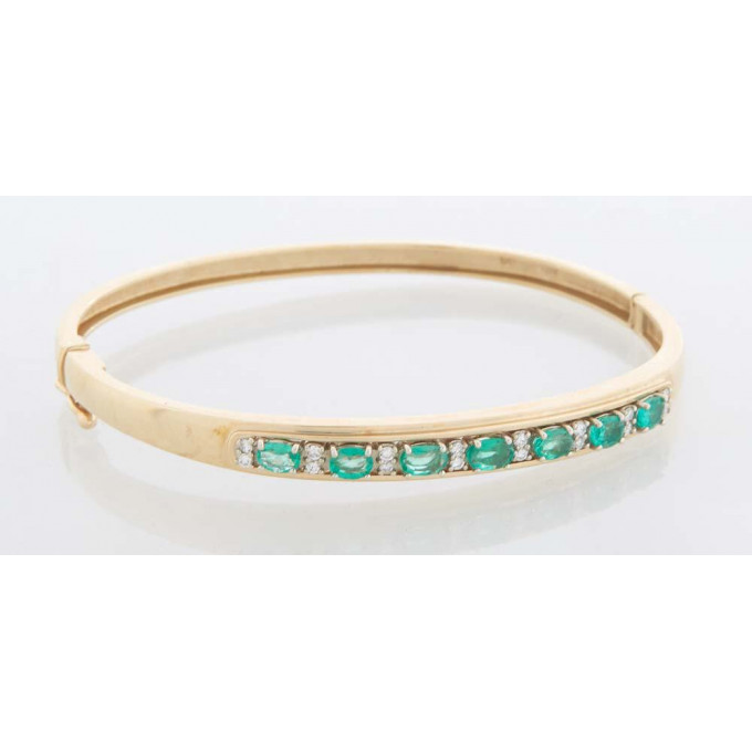 Appraisal: K Yellow Gold Emerald and Diamond Hinged Bangle Bracelet mounted