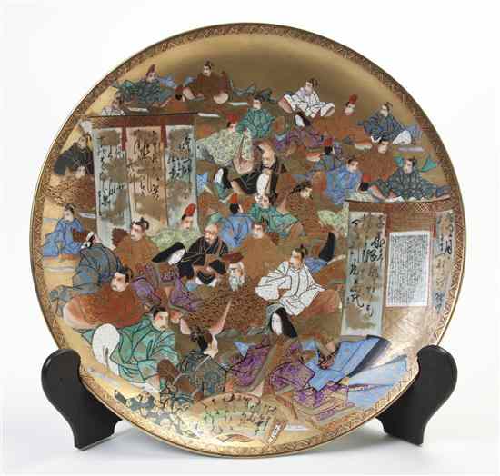 Appraisal: A Satsuma Charger depicting figures seated outdoors atop a gilt