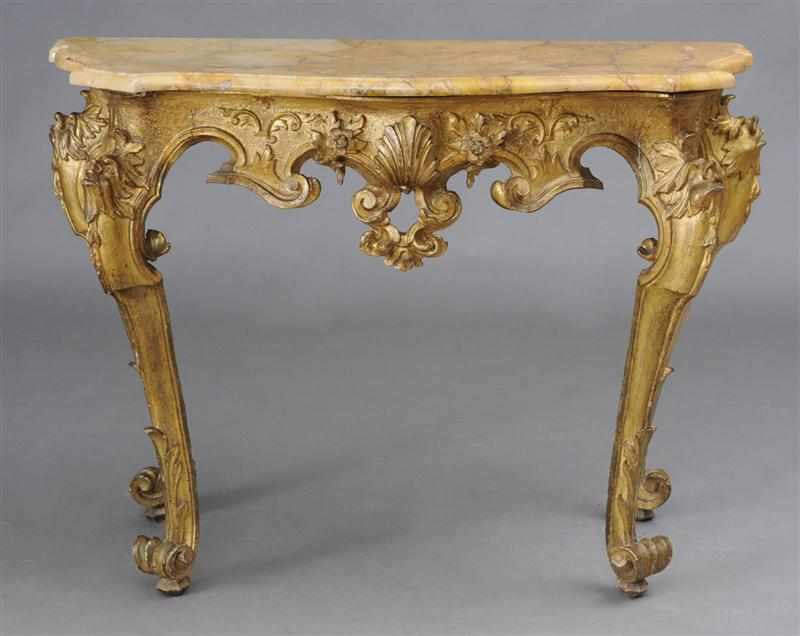 Appraisal: ITALIAN ROCOCO CARVED GILTWOOD CONSOLE TABLE ROMAN The serpentine-fronted siena