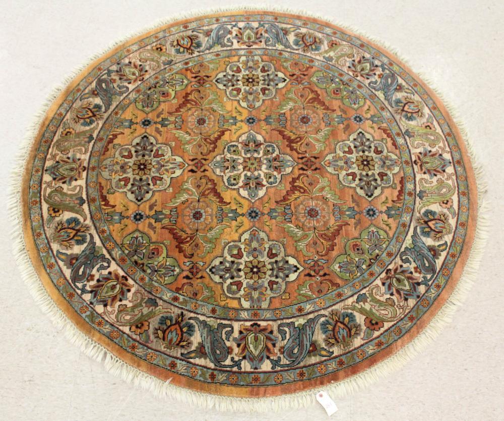 Appraisal: A ROUND ORIENTAL AREA RUG Indo-Persian floral and medallion design