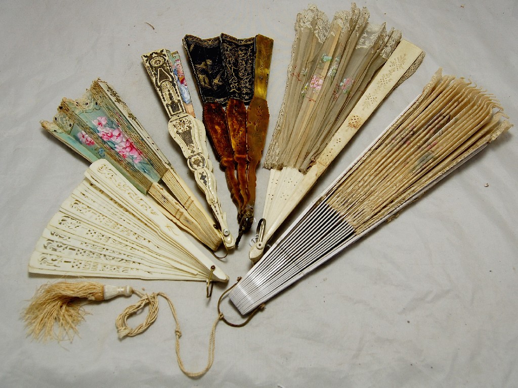 Appraisal: Tortoiseshell fan with printed painted and gilded paper leaf a