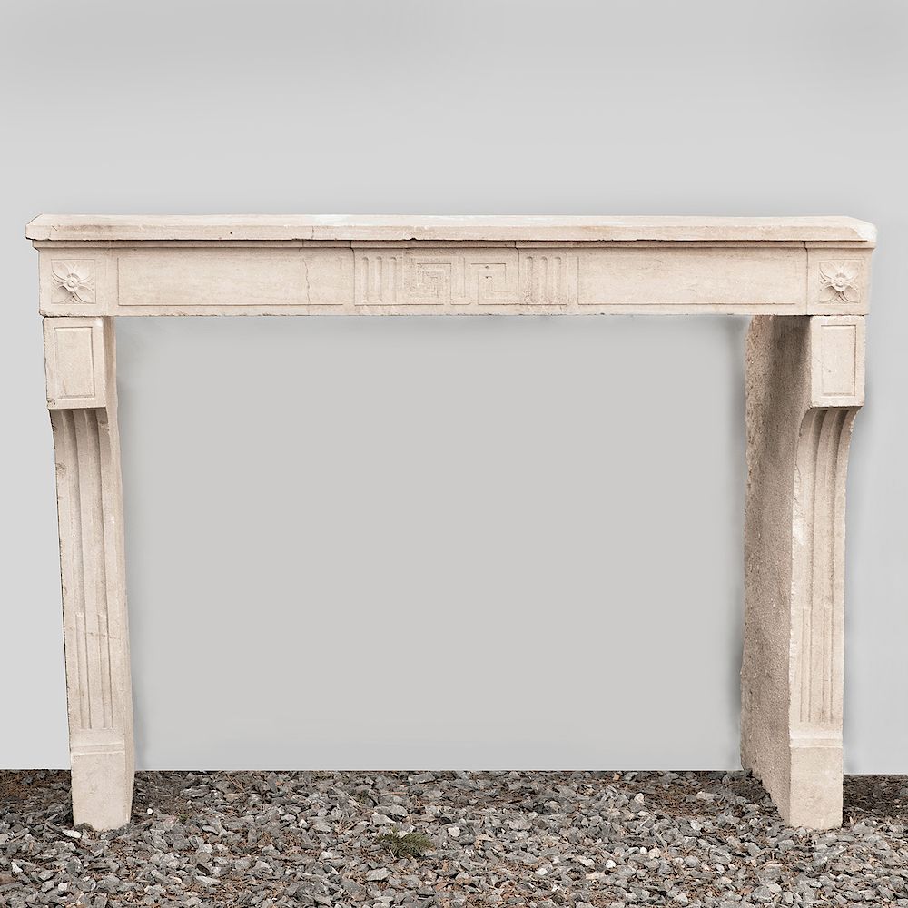 Appraisal: French Carved Limestone Fireplace in the Louis XVI manner In