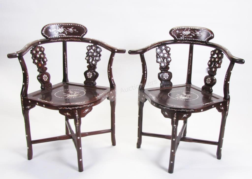 Appraisal: Pair of Indonesian Corner Chairs carved frames with inlaid mother