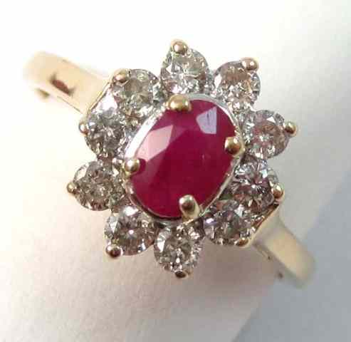 Appraisal: RUBY DIAMOND AND FOURTEEN KARAT GOLD RING ten round-cut diamonds