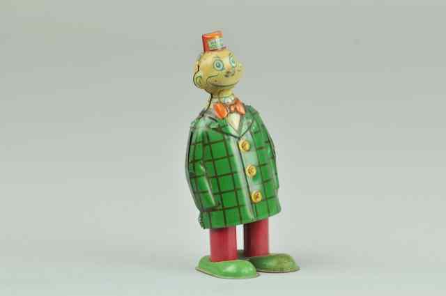 Appraisal: CHEIN HAPPY HOOLIGAN WALKER Lithographed tin colorful suited figure able