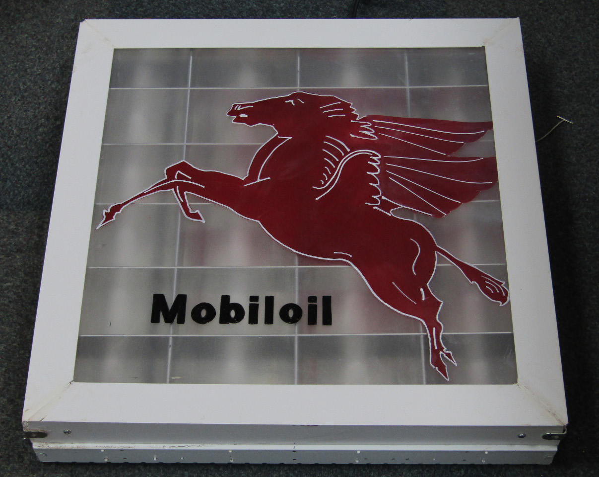 Appraisal: A Mobil oil glass and white wooden framed illuminated sign