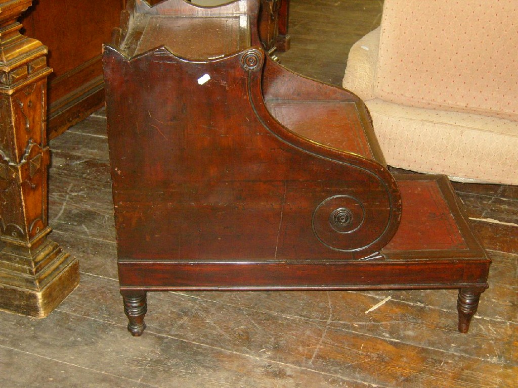 Appraisal: A Regency mahogany stepped commode of shaped form with inset