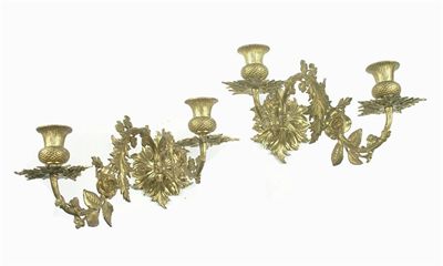 Appraisal: A pair of ormolu two branch wall lights the scroll