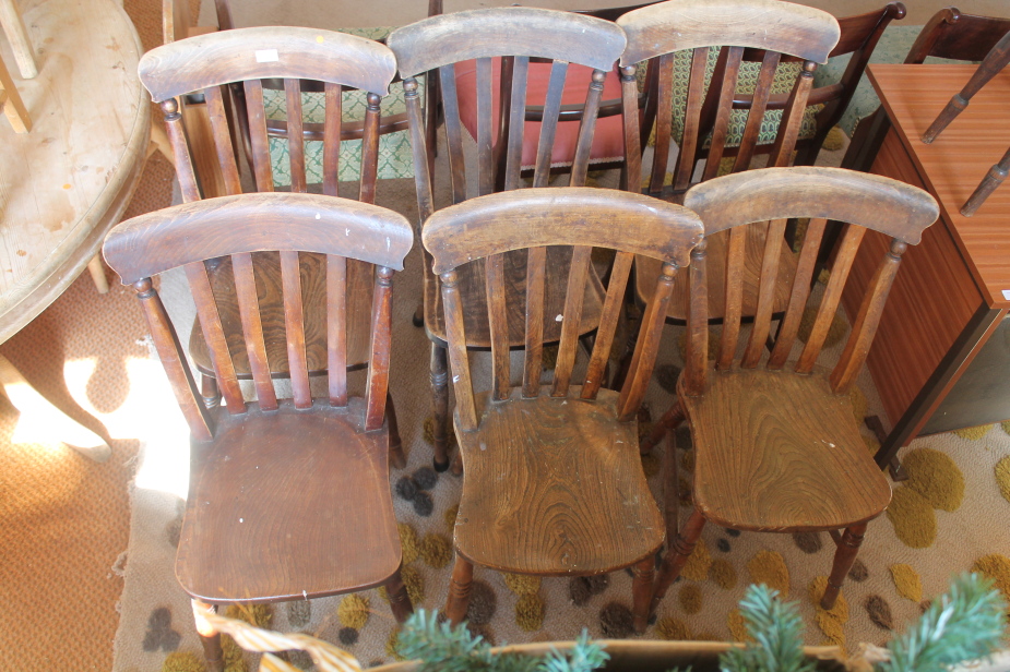 Appraisal: A set of six Victorian lath back kitchen chairs