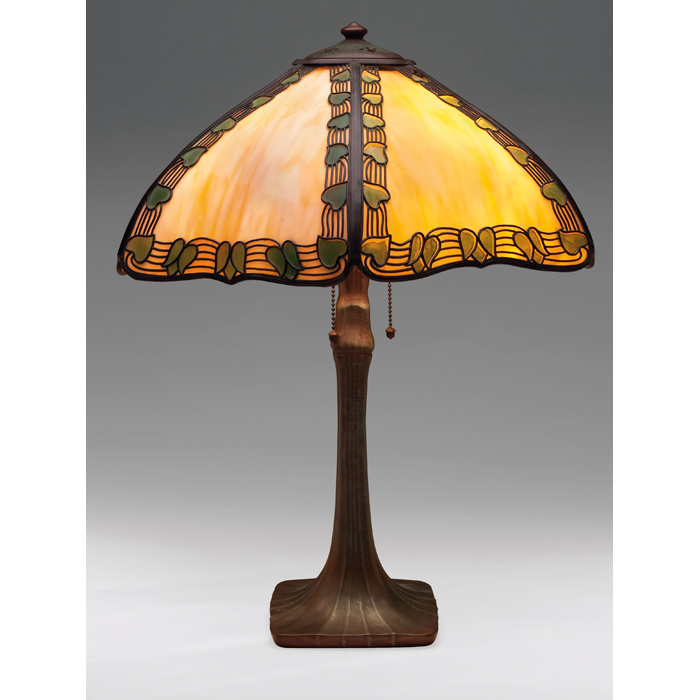 Appraisal: Handel lamp bronzed metal base supporting a caramel slag glass