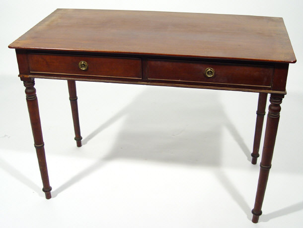 Appraisal: th Century mahogany writing table fitted with a pair of