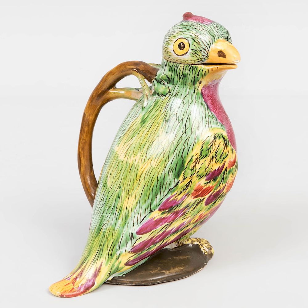 Appraisal: Continental Faience Parrot Jug and Cover Marked in underglaze manganese