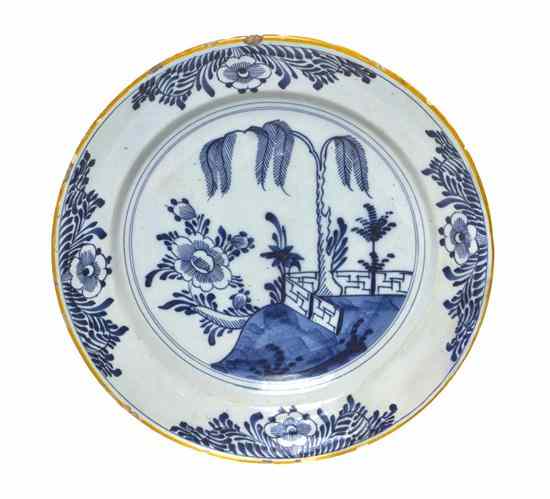 Appraisal: A Delft Charger of circular dished form decorated with a