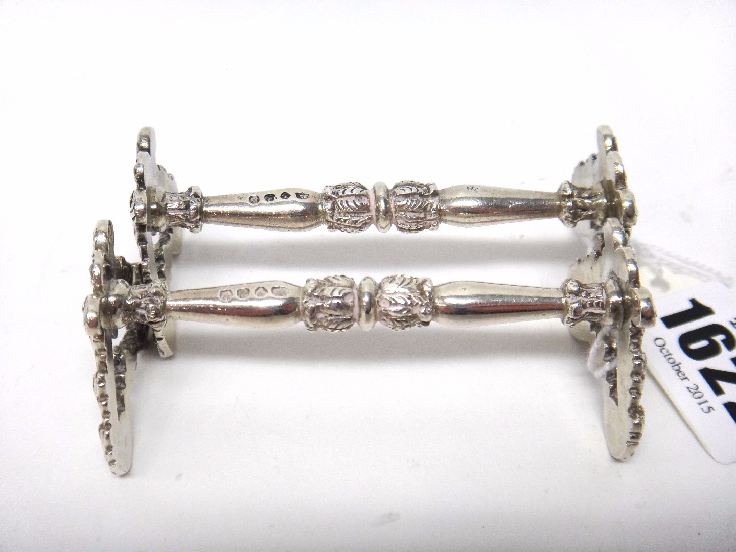 Appraisal: A pair of Victorian silver knife rests boldly decorated with