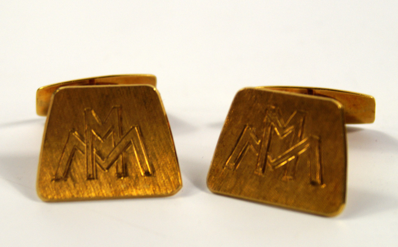 Appraisal: A pair of cufflinks textured finish monogram engraved in yellow