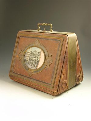 Appraisal: A th century continental brass and leather travel case with