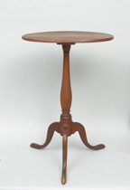 Appraisal: An Antique Candle Table Oval table with tripod base with