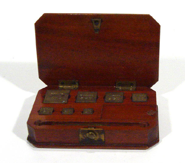 Appraisal: Late th Century mahogany cased set of brass weights cm