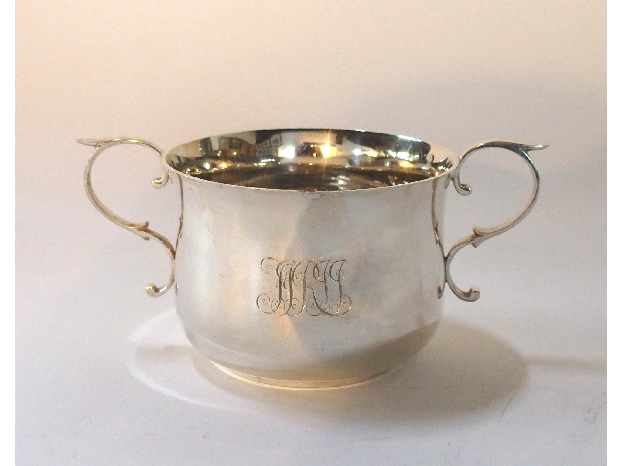 Appraisal: A silver porringer London oz