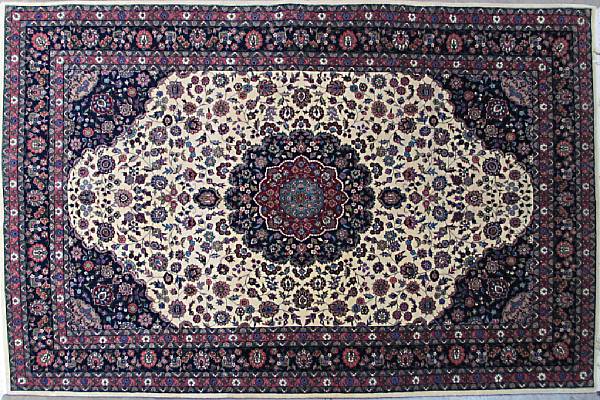 Appraisal: A Kashan design rug size approximately ft x ft