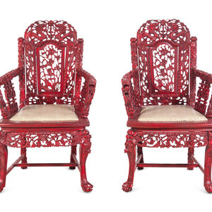 Appraisal: A Pair of Chinese Carved and Painted Wood Chairs Height