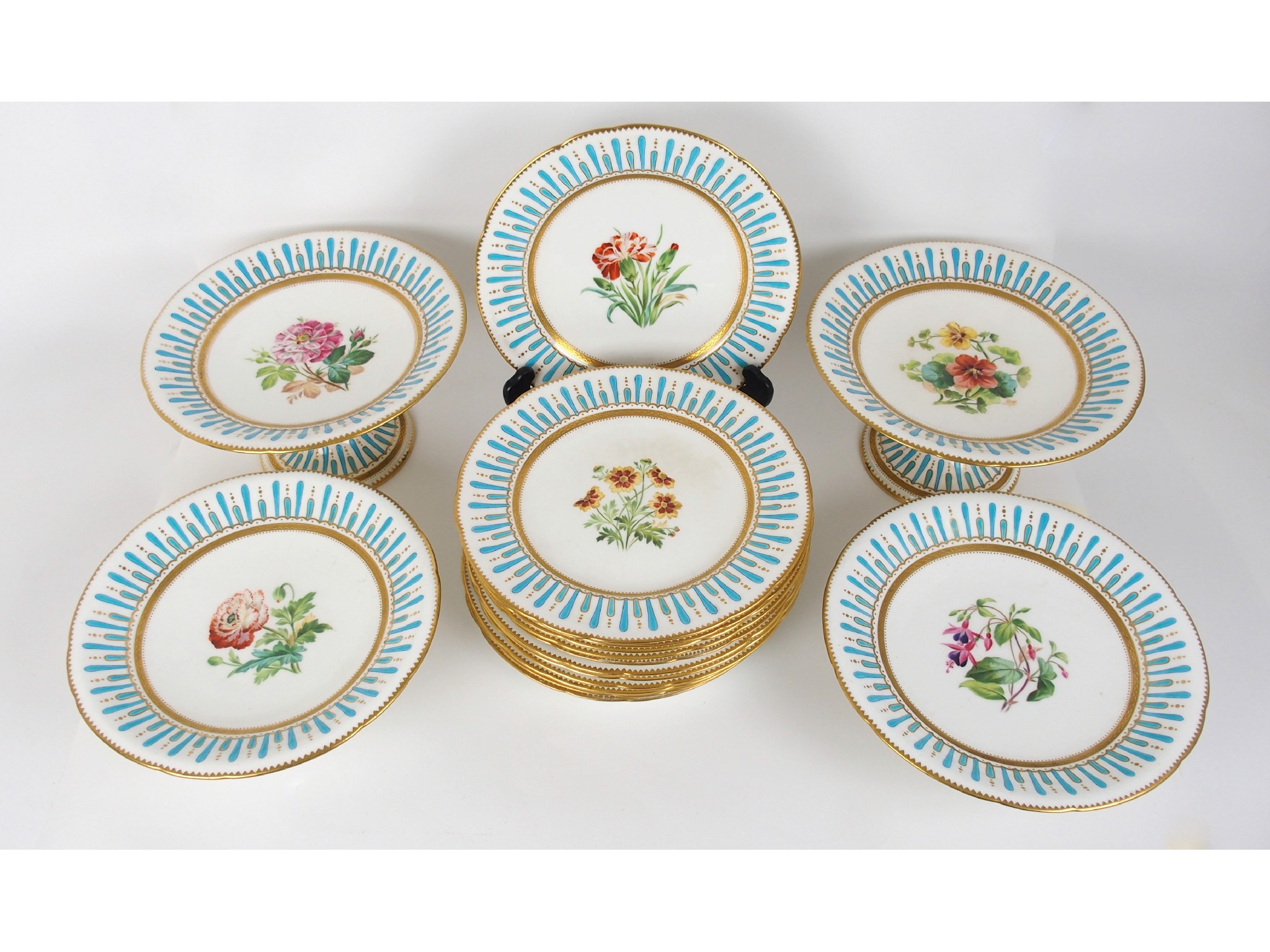 Appraisal: A Minton dessert servicepainted with specimen botanical plants within blue