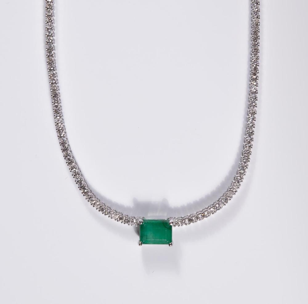 Appraisal: DIAMOND EMERALD AND FOURTEEN KARAT GOLD NECKLACE The k white