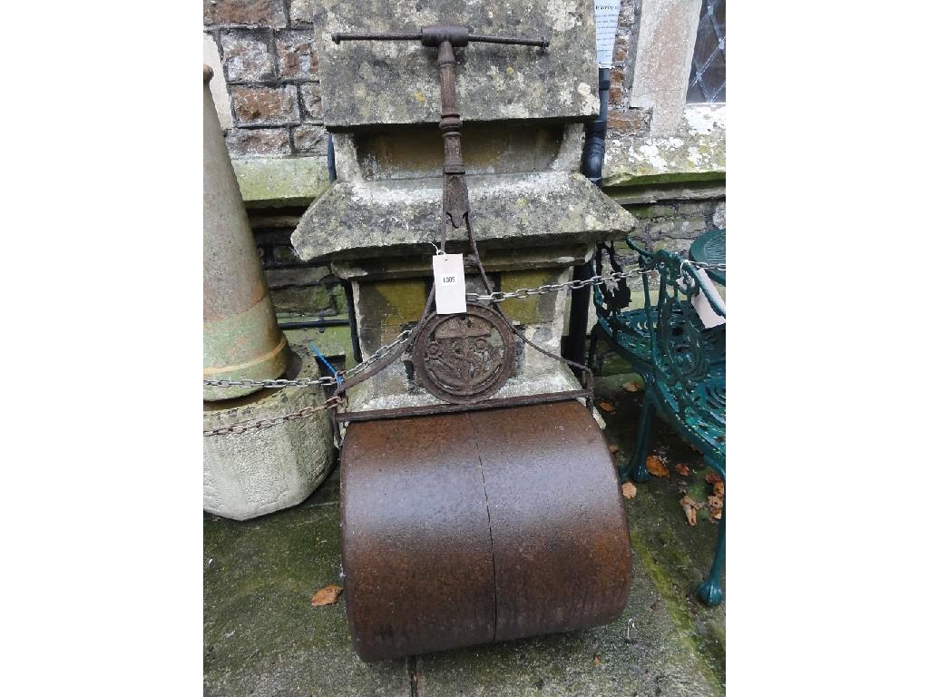 Appraisal: A Victorian cast iron garden roller with pierced anchor and