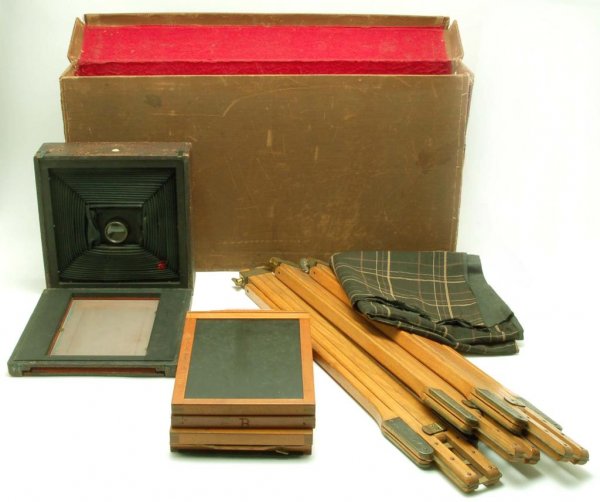 Appraisal: Housed in its original canvas case with tripod cape and