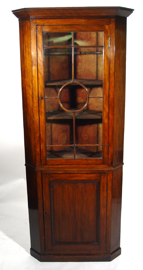 Appraisal: Victorian walnut standing corner cabinet the glazed door above a