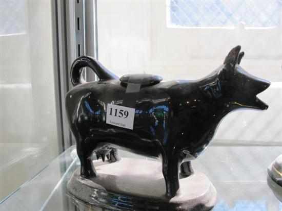 Appraisal: VICTORIAN STAFFORDSHIRE COW CREAMER