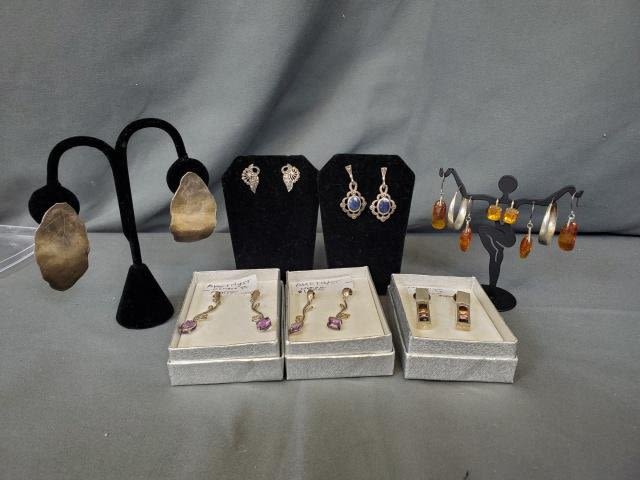 Appraisal: pairs of vintage silver earrings Includes pairs with Amethyst from