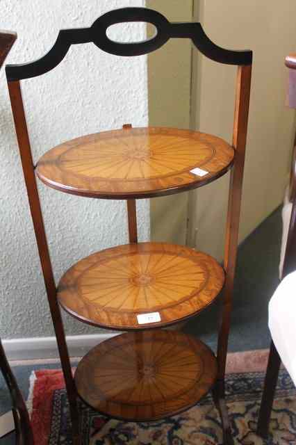 Appraisal: A REPRODUCTION THREE TIER FOLDING CAKE STAND with fan type