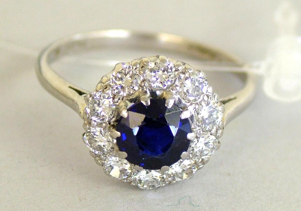 Appraisal: Platinum sapphire and diamond cluster ring