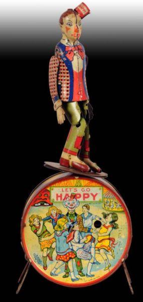 Appraisal: Early Tin Happy Hooligan Toy Description Lets Go Happy Crank-activated